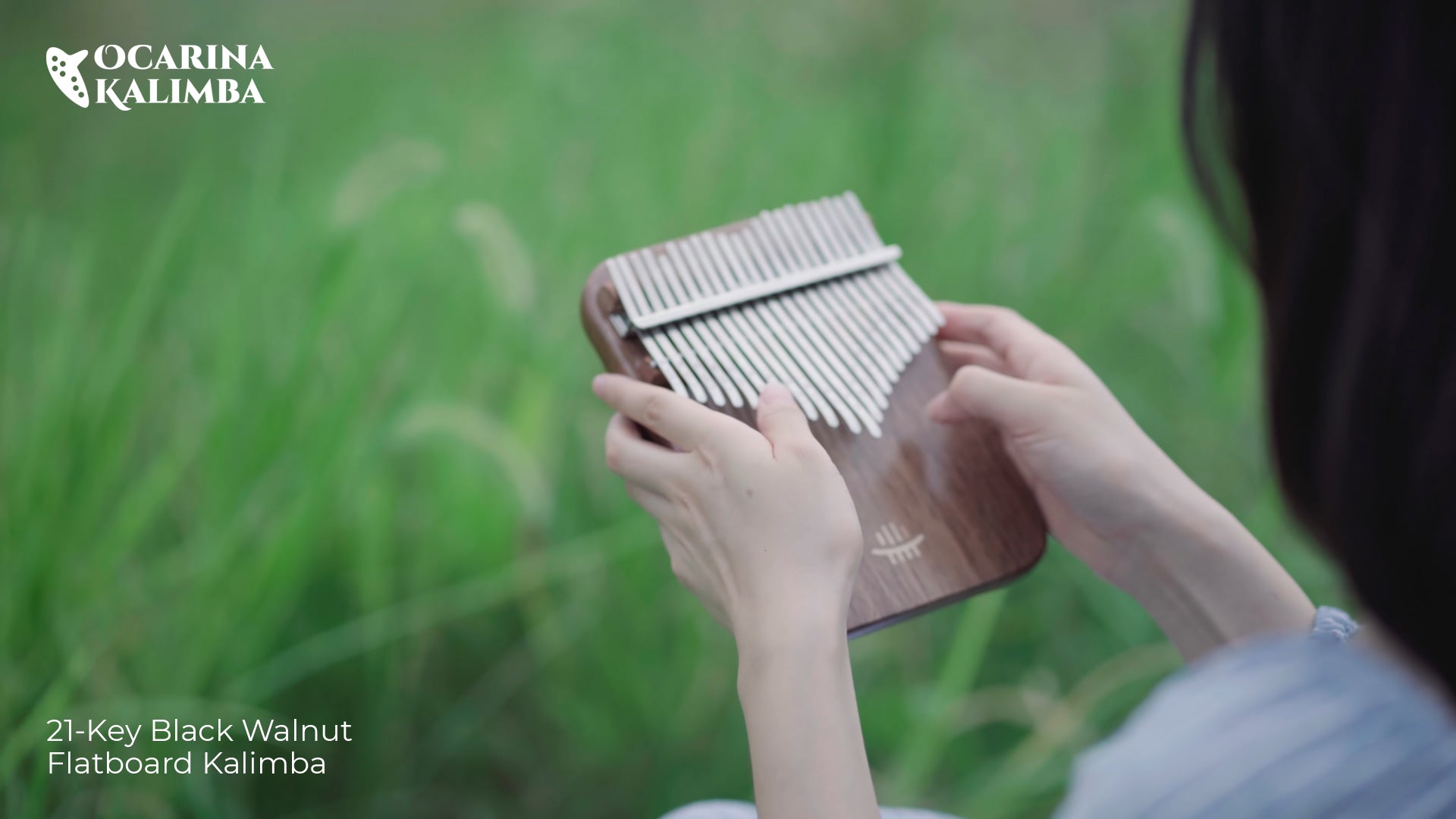Load video: Music video featuring the 21-Key Black Walnut Flatboard Kalimba from OcarinaKalimba.com